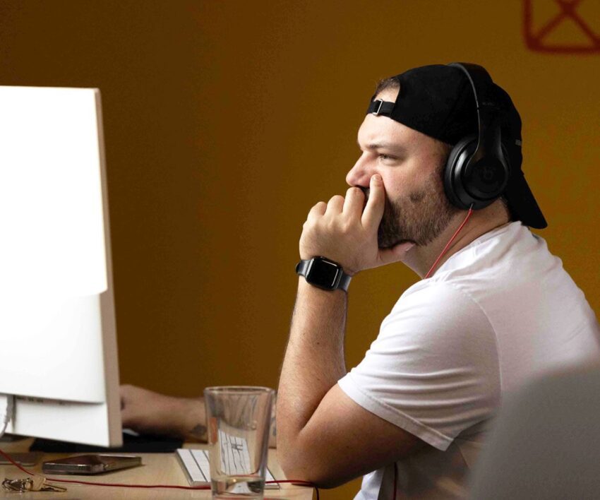 Orbiteer, Kyle, focused at his desk