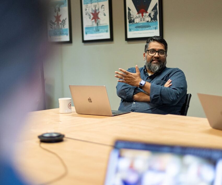 Orbiteer, Anand, having a discussion in a meeting