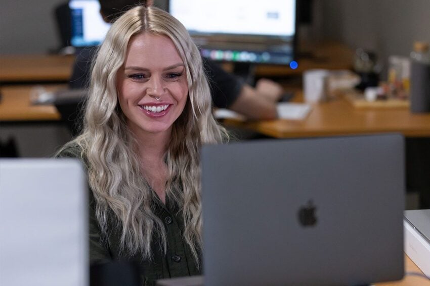 Jennifer working at her desk