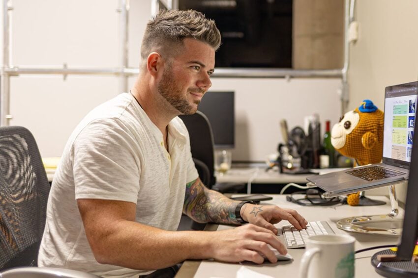 James working at his desk