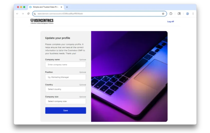 A web page displays a profile update form with fields for company name, position, country, and company size beside a photo of a laptop with purple lighting.